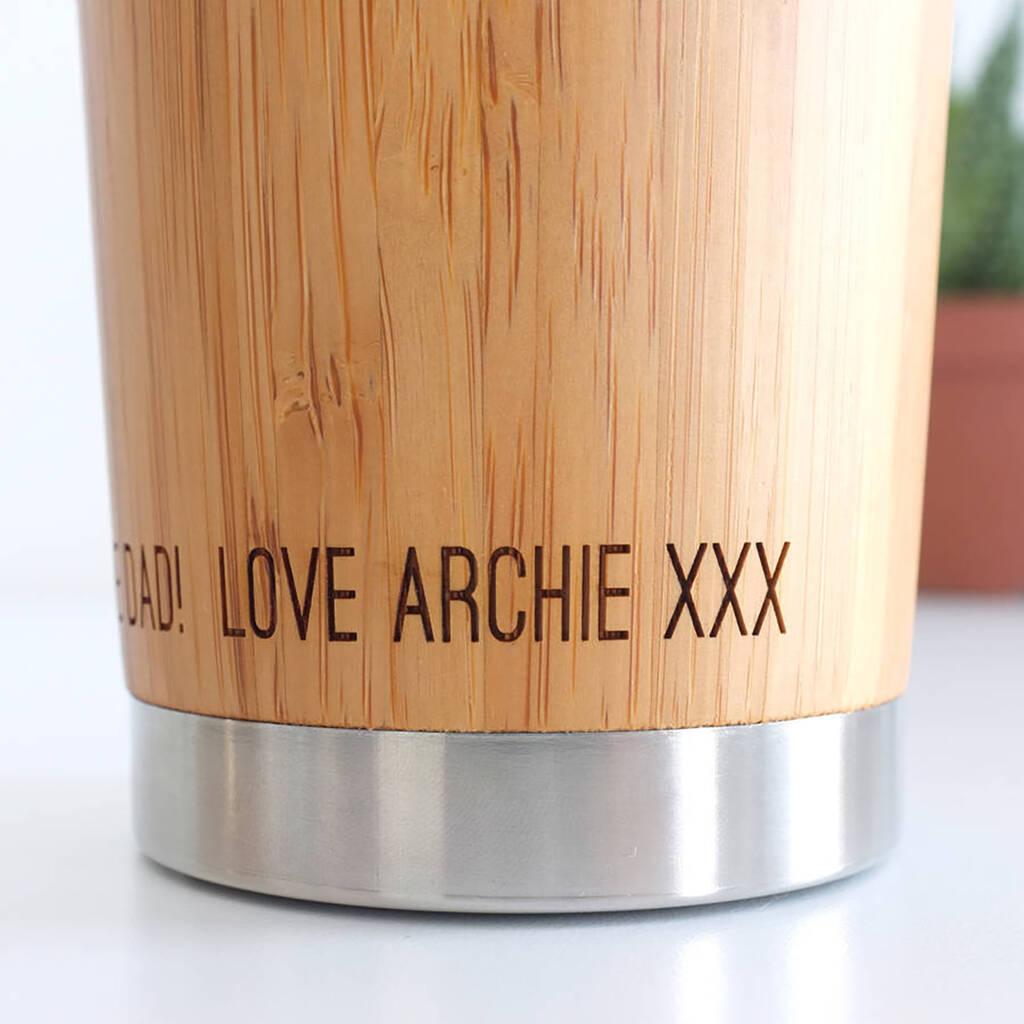 Close up of personalised text at the bottom of travel mug